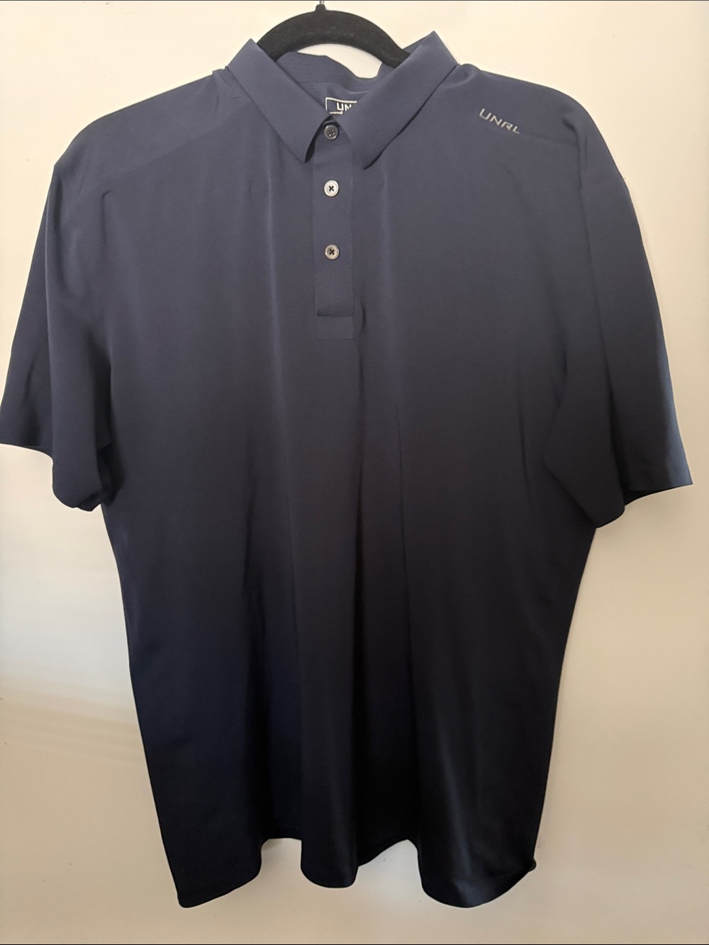 UNRL Men's Performance Polo in Navy